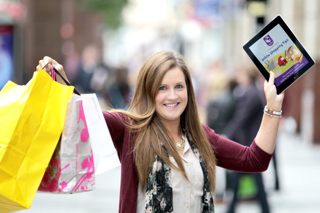 Caption - Consumer Hannah Close checks out the Consumer Council?s ?Online Shopping Tips? guide to ensure she knows her rights and shops safely online.